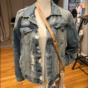 Jean jacket distressed light wash - Plaid inside.  never worn